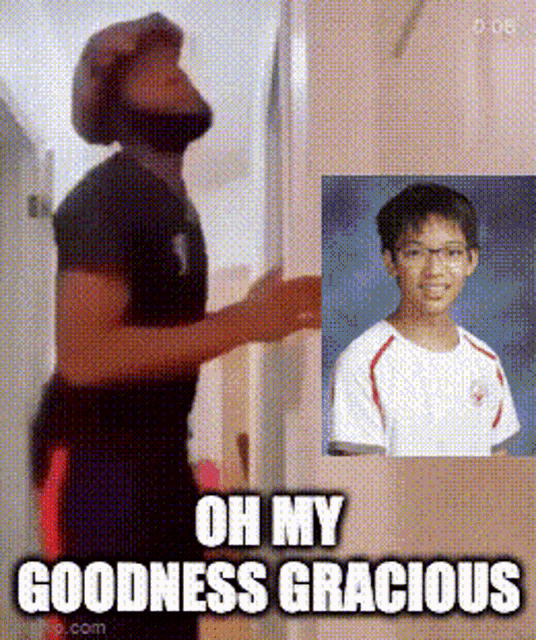 a man is standing in front of a picture of a young boy and says oh my goodness gracious