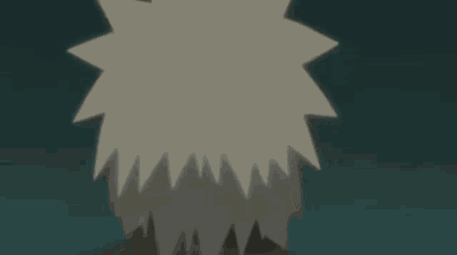 a close up of a person 's face with a shadow of a shark on the wall .