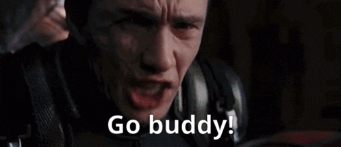 a close up of a man 's face with the words `` go buddy '' written on the bottom .