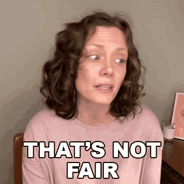a woman says that 's not fair in front of her