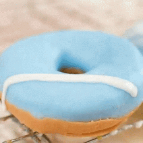 Donuts Blue Donut GIF - Donuts Blue Donut Icing GIFs