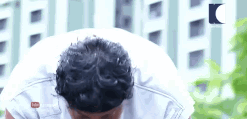 a man bending over with a youtube logo on the bottom