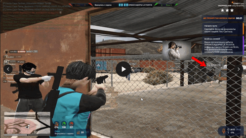 a screenshot of a video game shows a man holding a gun and another man standing behind a chain link fence