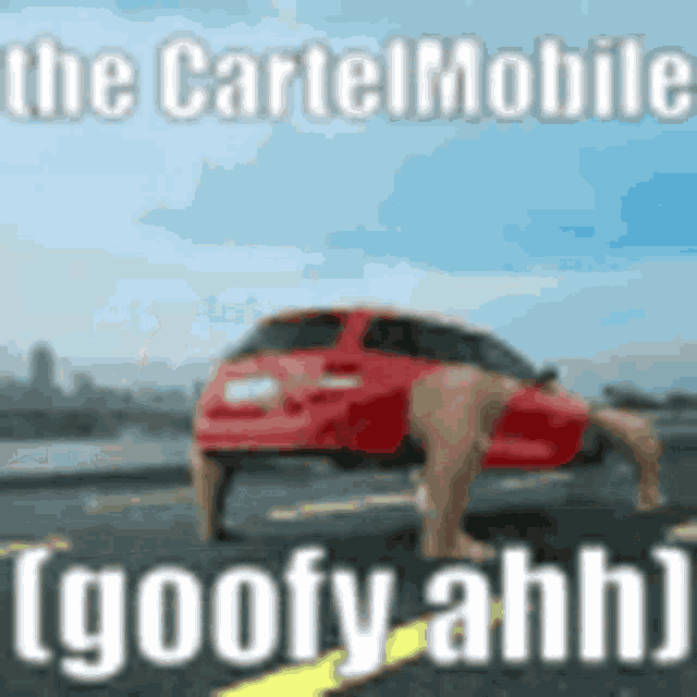 a red car with a person 's legs sticking out of it is on a road .