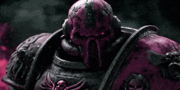 a statue with a skull on it is surrounded by pink flames