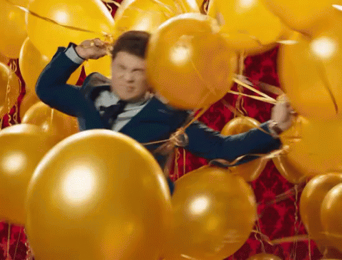 Caught In Balloons GIF - Mtv Awards Adam Devine Caught Up GIFs