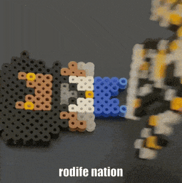 a row of perler beads with the words rodife nation below them