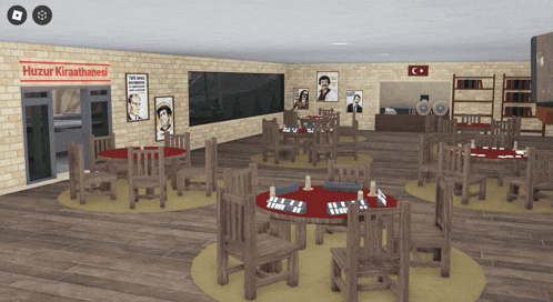 a room with tables and chairs with a sign that says huzur kiraathanesi