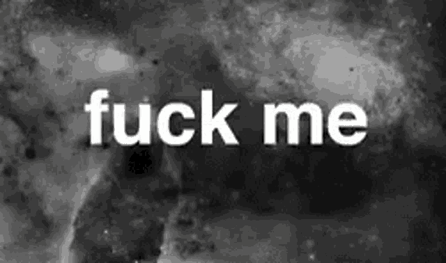 a black and white photo of a galaxy with the words fuck me written on it .