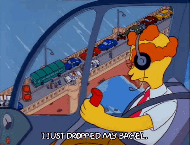 a cartoon character says " i just dropped my bagel " while driving