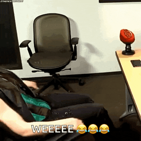 a person is sitting in an office chair with the word weeeee written on the bottom