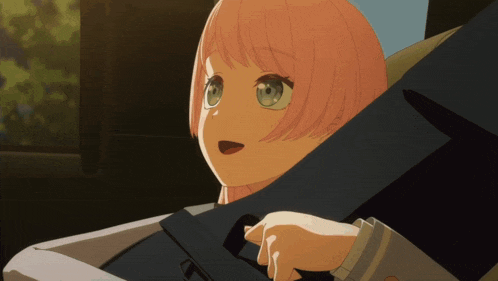 a girl with pink hair is sitting in a car seat