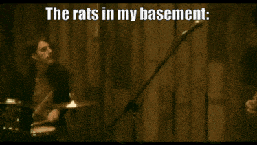 a blurred image of a person with the words the rats in my basement