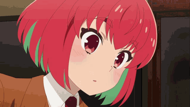 a cartoon girl with red hair and green highlights