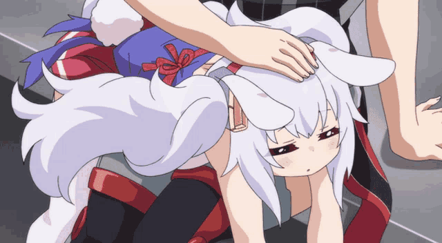 a person is petting a cartoon character with white hair and red eyes