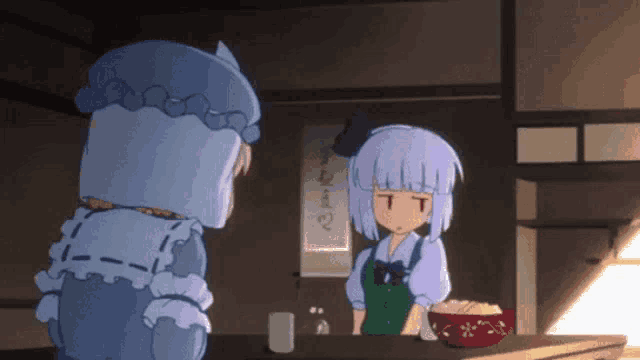 two anime girls are standing next to each other in a room with chinese writing on the wall