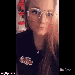a woman wearing glasses and a black shirt that says brewed lollipops