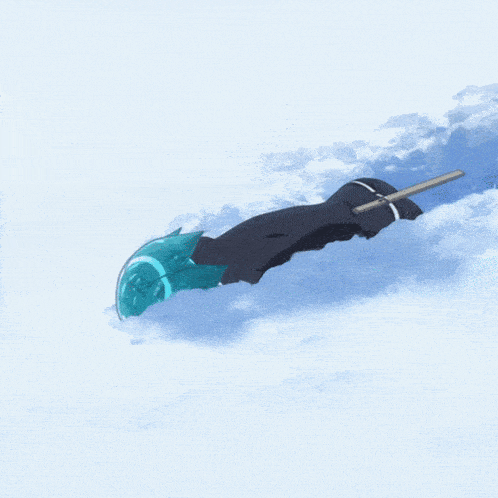 a person is laying in the snow holding a blue object