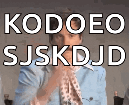 a man in a blue jacket with the words kodoeo sjskdjd on the top