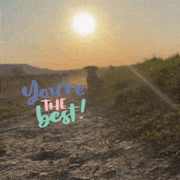 a sunset with the words you 're the best written on the ground