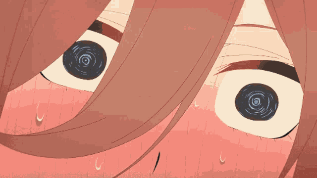 a close up of a girl 's eyes with a swirl in the middle