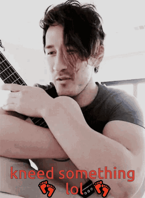 a man is kneeling down with his arms crossed and the words " kneed something lol " above him