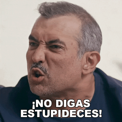 a man with a mustache is making a funny face and says no digas estupides