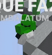 a green minecraft character is sitting on top of a concrete block .