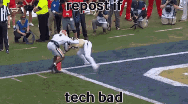 a football player is being tackled by another player on a field with the caption tech bad