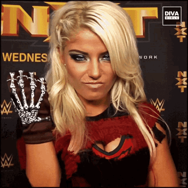 a blonde woman in front of a sign that says diva direct