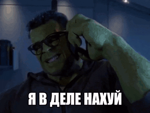 the hulk is wearing sunglasses and talking on a phone