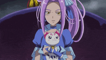 a girl with purple hair is holding a small white cat with a heart on it