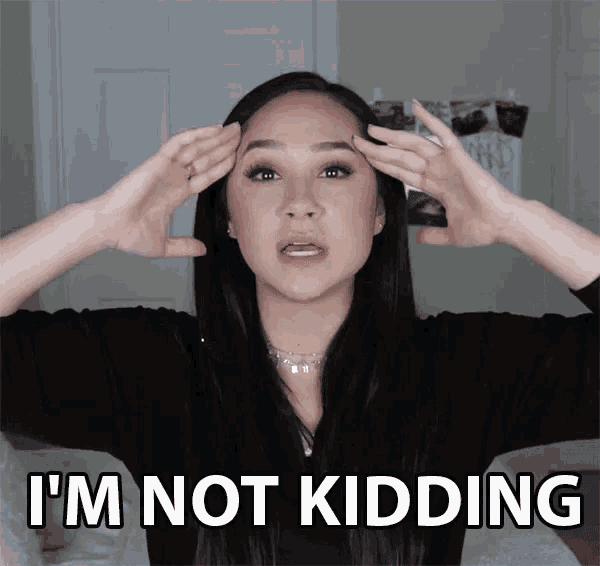 a woman says i 'm not kidding and holds her hands to her head