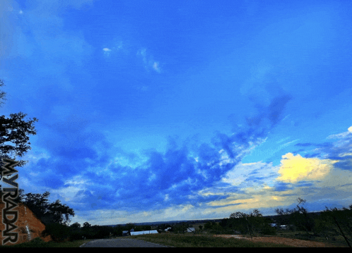 a picture of a blue sky with clouds and the words my dar on the bottom