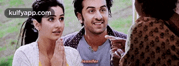 a man and a woman are talking to each other in a movie .