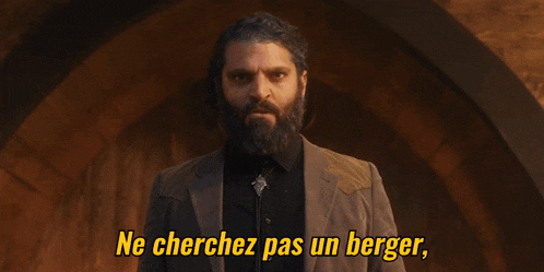 a man with a beard and the words devenez un loup