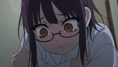 a close up of a girl wearing glasses and a white shirt