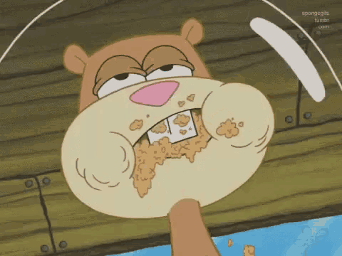 sandy cheeks from spongebob squarepants is eating cereal with her mouth open .