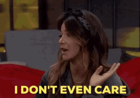 a woman says i don t even care while sitting on a couch
