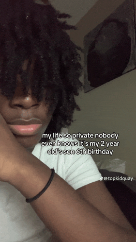 a man with curly hair is taking a selfie with the caption my life so private nobody even knows