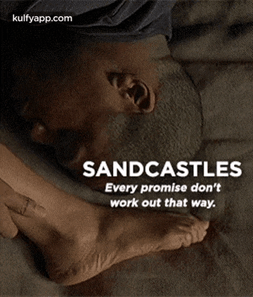 a man is laying upside down on a bed with the words sandcastles every promise do n't work out that way .