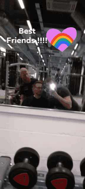 two men are taking a picture of themselves in a gym with the words best friends !!!