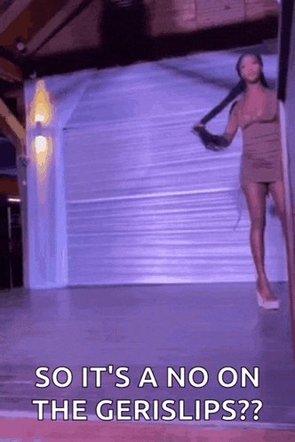 a woman in a short dress is standing in front of a garage door with the words so it 's a no on the gerislips