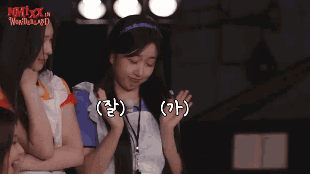 nmix in wonderland is written on the bottom of a girl 's headband
