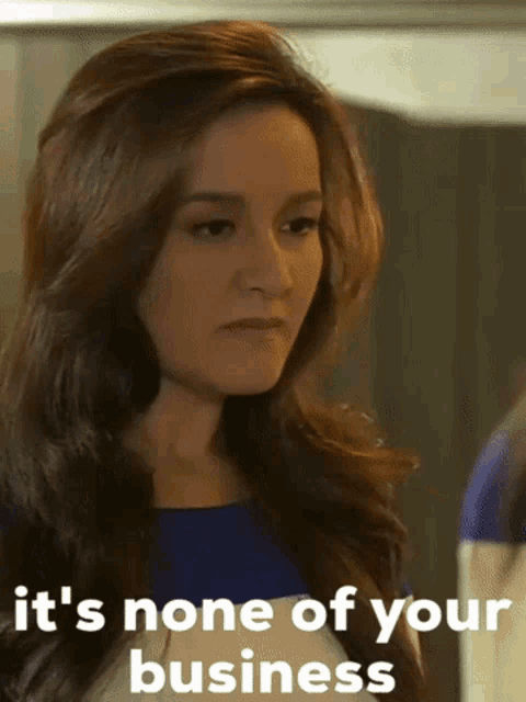 a woman says it 's none of your business while looking at herself