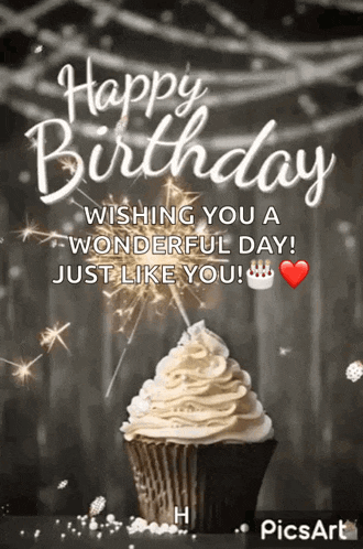 a happy birthday greeting card with a cupcake and sparklers .