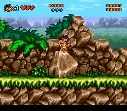 a video game screen shows a caveman standing on a rock with bones and shout