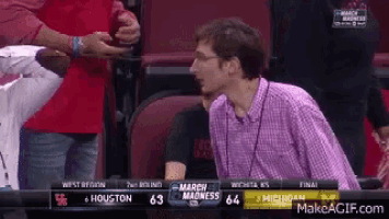 a basketball game between houston and michigan