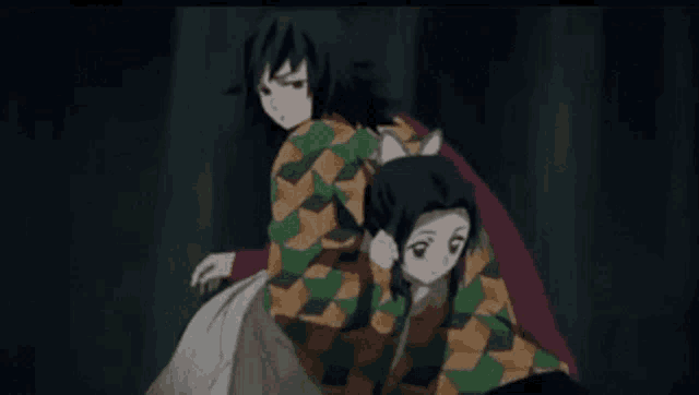 a couple of anime characters are standing next to each other in a dark room .