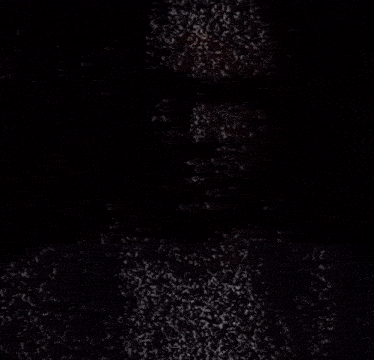 a close up of a person 's face covered in a blanket .
